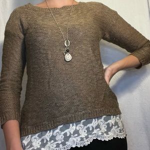 Brown knitted sweater with white lace at bottom
